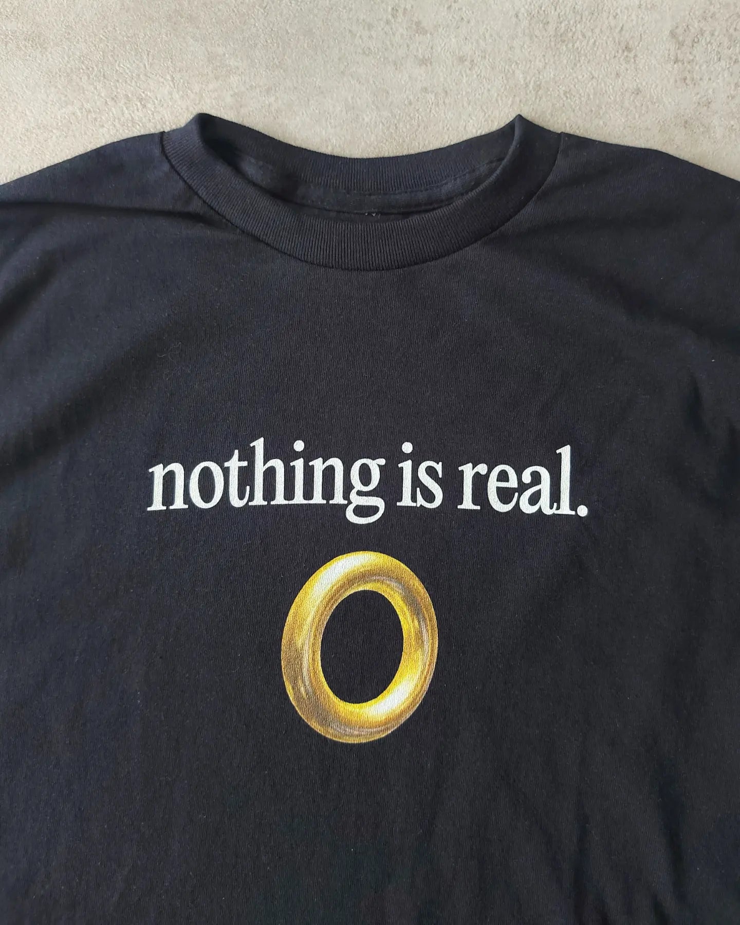 Buy Rock Off Nothing Is Real Tshirt in Navy Buy Rock Off Nothing Is Real Tshirt in Navy